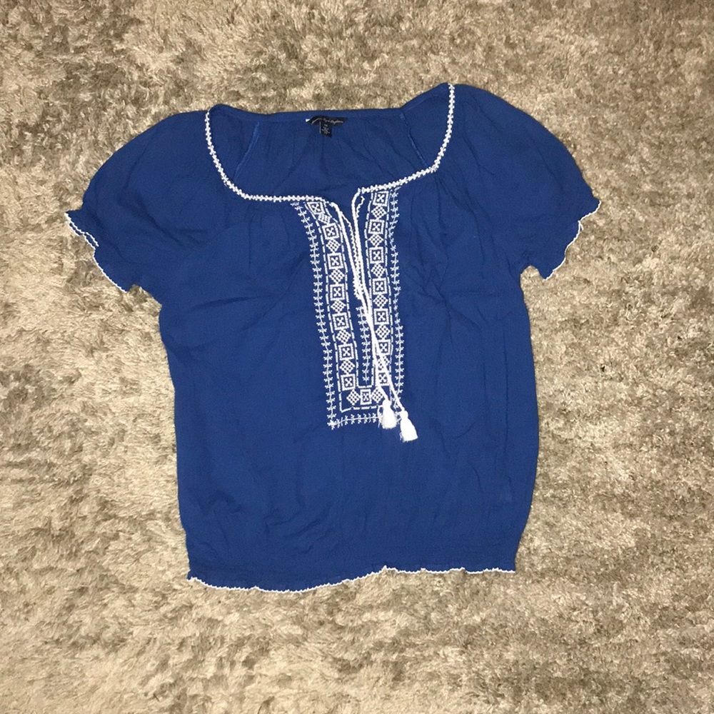 Royal blue flowy blouse with white design